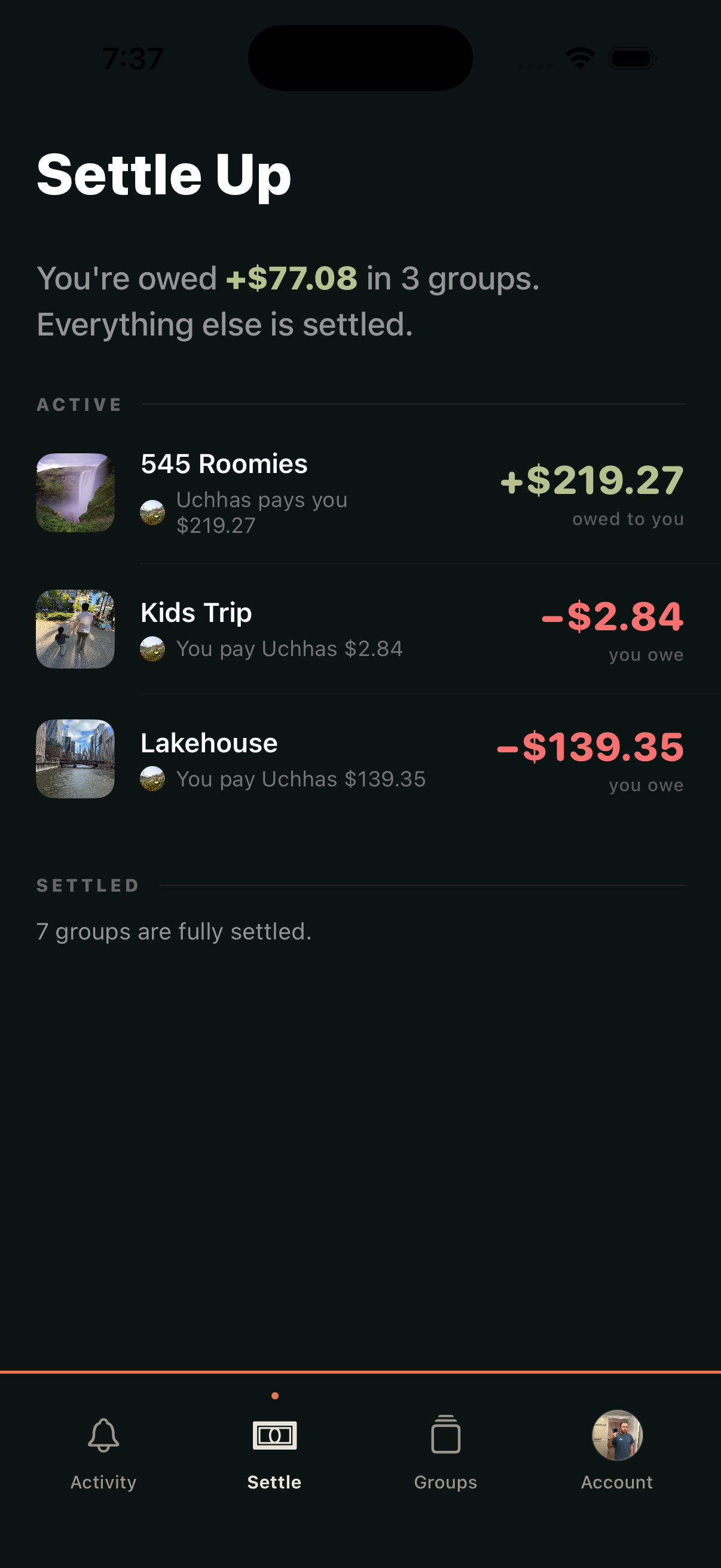 Settle Up tab showing active balances and a settled groups summary